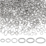 600Pcs 6 Styles 304 Stainless Steel Open Jump Rings, Oval, Stainless Steel Color, 4~10x3~6x0.6~1mm, Inner Diameter: 1.5~4x2.5~8mm, 100pcs/style