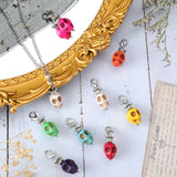 20PCS Skull Synthetic Howlite Pendant Decorations, with Brass Rhinestone Beads and Zinc Alloy Lobster Claw Clasps, Mixed Color, 48mm, Pendant: 28x14x18mm