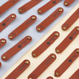 30 Sets 2 Style PU Leather Labels, Handmade Embossed Tag, with Holes & Iron Rivet, for DIY Jeans, Bags, Shoes, Hat Accessories, Rounded Rectangle with Word, Mixed Patterns, 12x65x0.5mm, Hole: 2.6mm, 15sets/style
