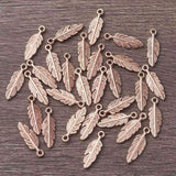 Tibetan Style Alloy Pendants, Feather, Rose Gold, 15x5x1.5mm, Hole: 1mm., 30pc/Set